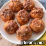 Banana Pecan Swirls 19 Banana Pecan Roll recipe - on white plate with bananas alongside