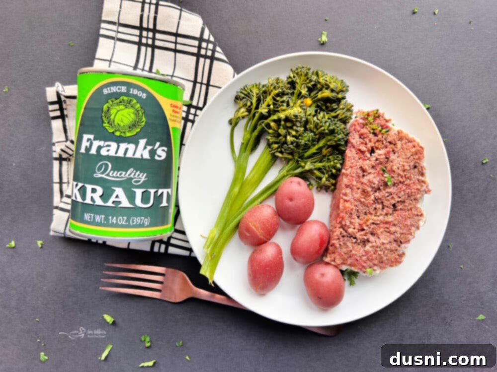 Deli-Style Meatloaf 4 Close-up of Reuben Meatloaf topped with Swiss cheese sauce and parsley