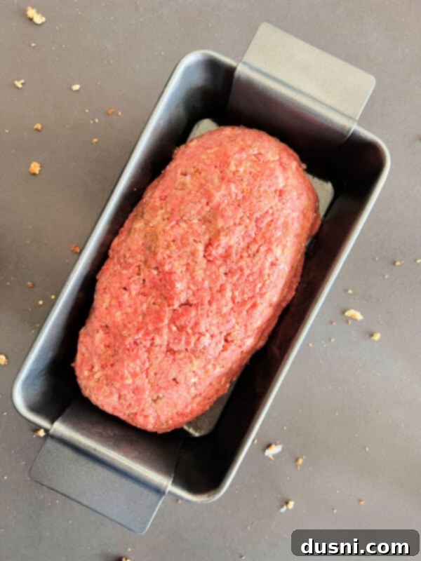 Deli-Style Meatloaf 10 Mixing all meatloaf ingredients in a bowl