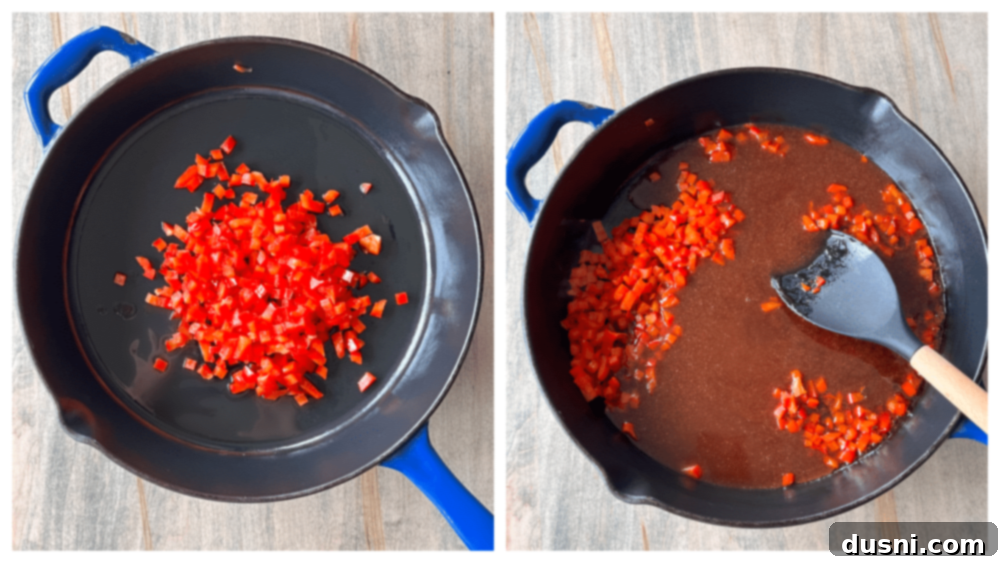 Bell peppers sauteing in a skillet