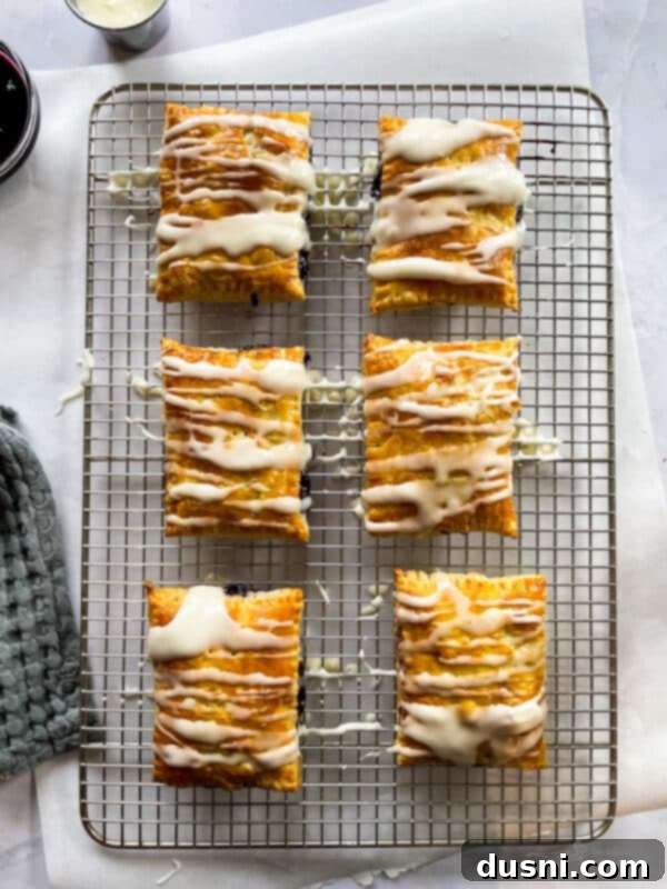 Homemade blueberry toaster strudel drizzled with glaze