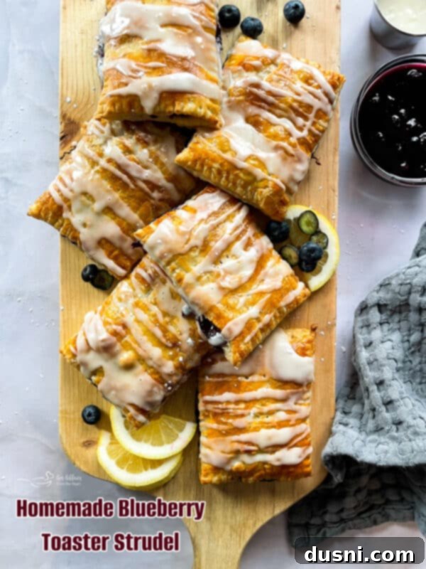 Homemade Blueberry Toaster Strudel with white glaze