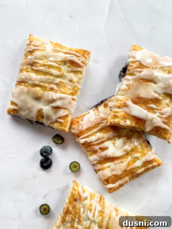 Assembling homemade blueberry toaster strudels