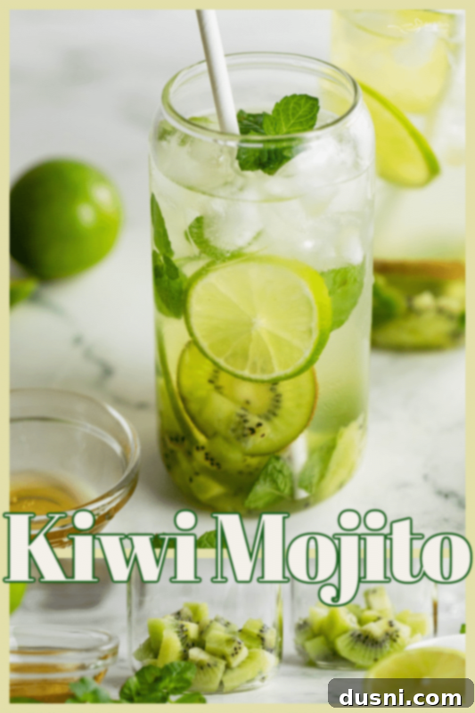 Vibrant Kiwi Mojito 9 Close-up of a beautifully garnished Kiwi Mojito cocktail.