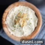 Golden Chicken Cracker Dip 12 Chicken in a Biskit dip in a wood bowl.