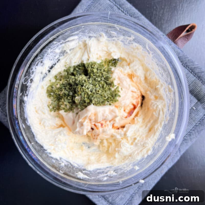 Golden Chicken Cracker Dip 5 Step-by-step: Beating cream cheese for dip