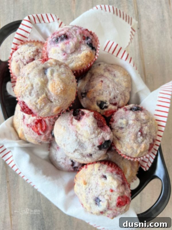Bisquick Muffins - a golden brown muffin with berries