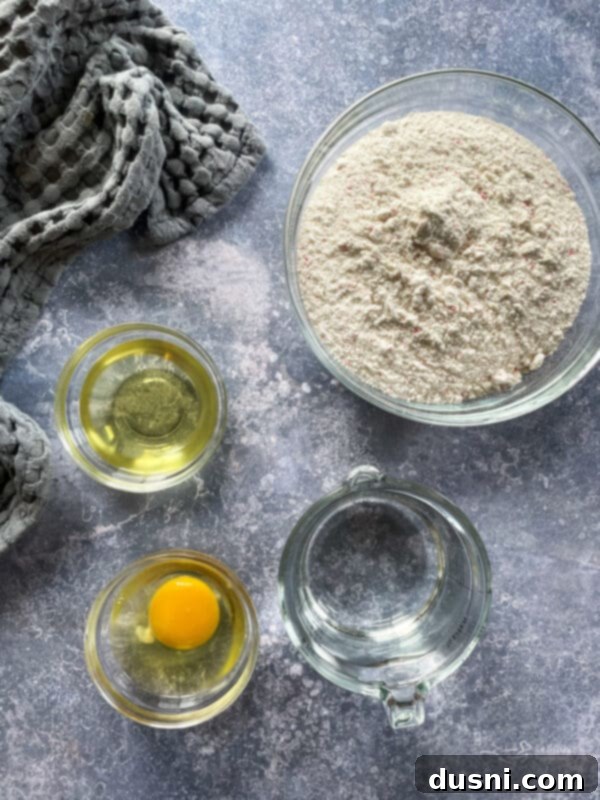 Sun-Kissed Strawberry Lemonade Donuts 4 A close-up of a strawberry lemonade donut with a bite taken out, showing the pink interior