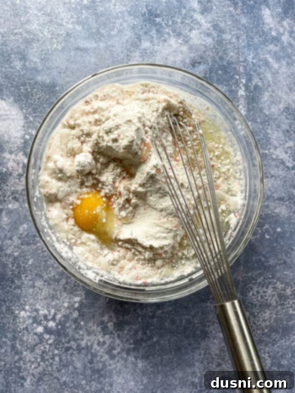 Sun-Kissed Strawberry Lemonade Donuts 5 Ingredients for strawberry lemonade donuts, including cake mix, egg, oil, water, cream cheese, powdered sugar, and lemons