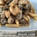 close up of Chicken with Mushrooms and Asiago Cream Sauce