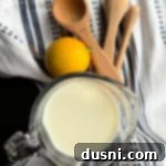 Clever Buttermilk Replacements 11 Buttermilk Substitute image with milk and lemon and measuring spoons