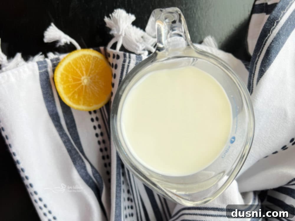 Clever Buttermilk Replacements 3 Close-up of milk being measured for a buttermilk substitute