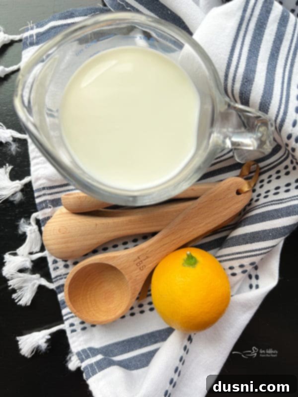 Clever Buttermilk Replacements 6 Two glasses of buttermilk substitute, one with lemon, one with vinegar