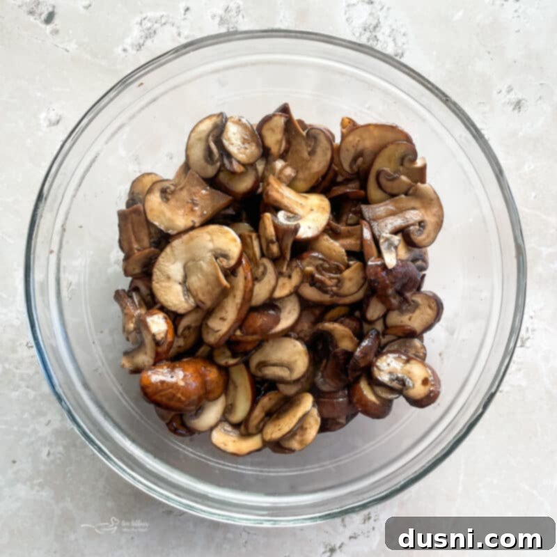 Classic Salisbury Steak with Savory Mushroom Gravy 8 Sautéed mushrooms removed from the skillet, ready for gravy
