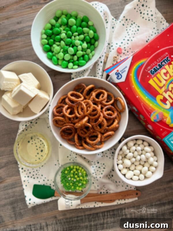 Pot of Gold Snack Blend 6 Ingredients for Lucky Leprechaun Bait laid out on a table.