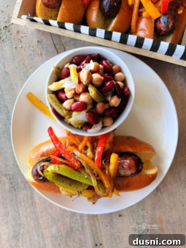 Plated Italian Sausages with Peppers and Onions