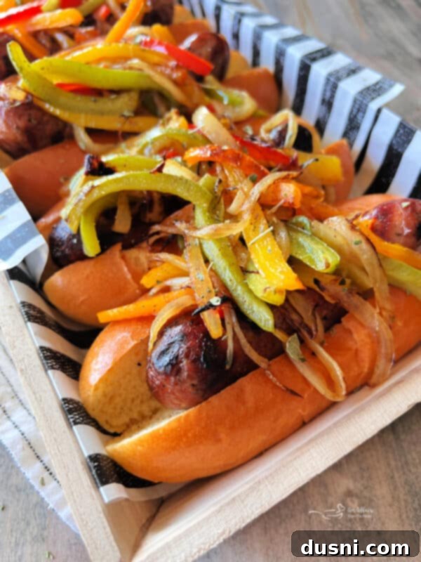 Peppers and onions sautéing in a skillet