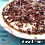 Fireside Smores Cream Pie 2 S'mores Cream Pie on a blue surface with text 's'mores cream pie'