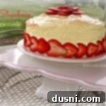 Side View of Strawberry Lemonade Cake on a white square cake plate and text 'Strawberry Lemonade Cake'