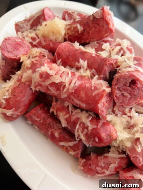 Savory Smoked Kielbasa and Sauerkraut 2 Baked Smoked Polish Sausage and Sauerkraut in a Dutch oven