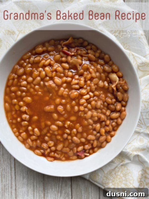 Grandma's Heirloom Baked Beans 6 A top-down view of Grandma's Baked Beans in a rustic serving dish.