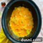 Slow Cooker Green Chile Chicken Enchilada Casserole in the slow cooker