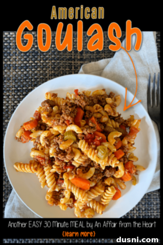 American Goulash served in a bowl with a fork