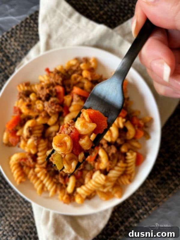 Close-up of a forkful of American Goulash