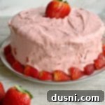 Velvet Strawberry Dream 12 Strawberry Cake on a white plate