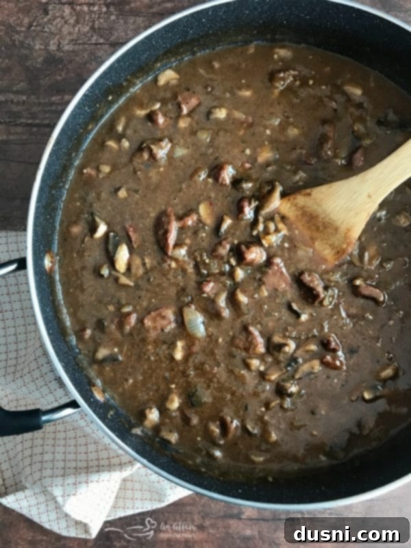 Tender Beef Tips in Rich Gravy 10 Finished Beef Tips & Gravy, thick and rich, ready to be served.