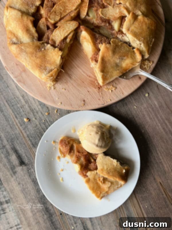 Freshly baked apple crostata cooling on a wire rack