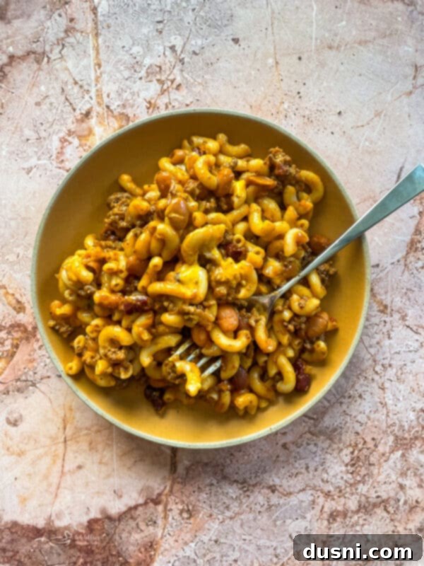 Hearty One-Pan Chili Mac 3 Close up of Chili Mac Skillet in a pan.