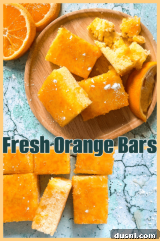 Sunshine Orange Bars 11 Fresh Orange Bars on a blue background and wooden plate, perfectly sliced.
