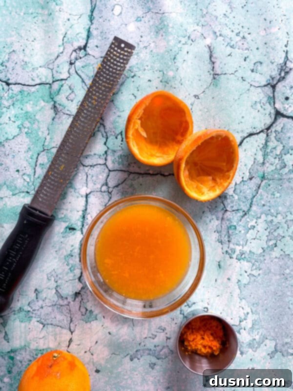 Sunshine Orange Bars 6 Preparing orange zest and juice for Fresh Orange Bars.