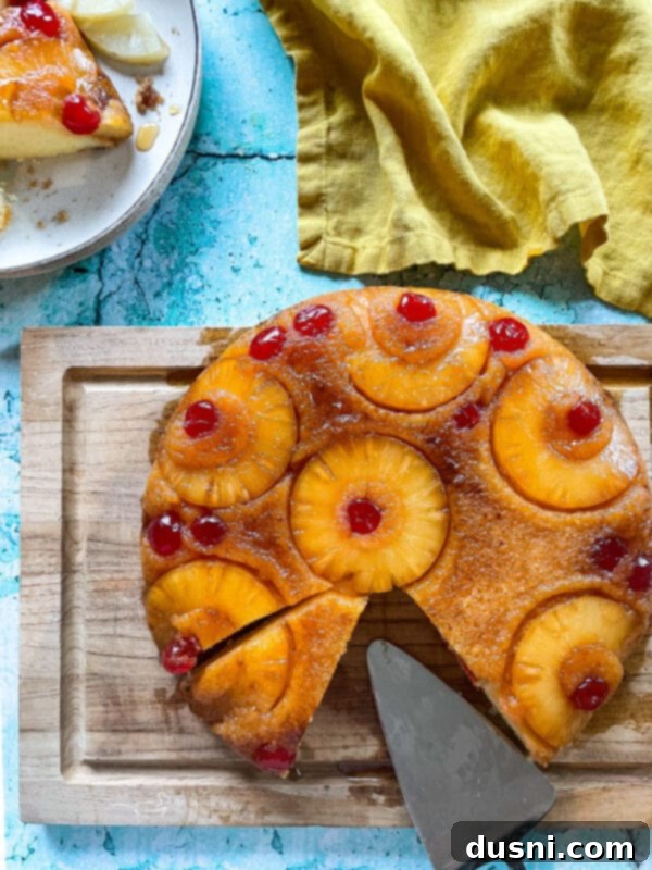 The Ultimate Homemade Pineapple Upside Down Cake 19 Pineapple Upside Down Cake on a wire rack