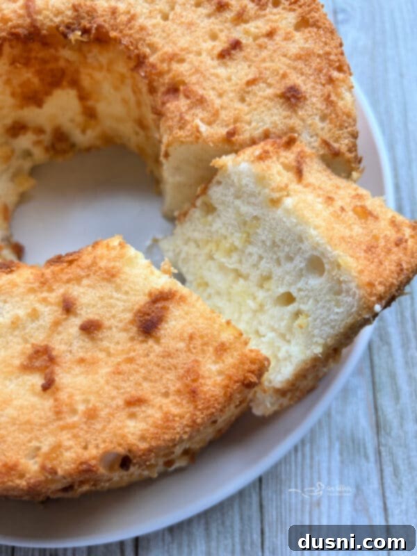 The Ultimate Homemade Pineapple Upside Down Cake 21 (Two Ingredient) Pineapple Angel Food Cake one slice cut