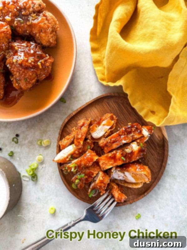 Honey-Glazed Crispy Fried Chicken 18 A final shot of crispy honey fried chicken on a serving plate.