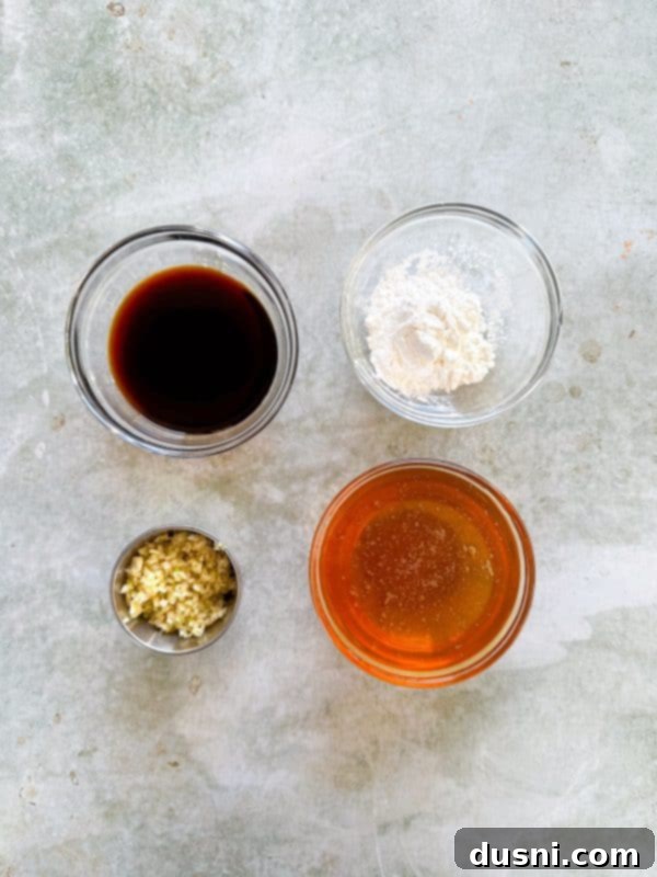 Honey-Glazed Crispy Fried Chicken 6 Close-up of honey garlic sauce in a bowl.