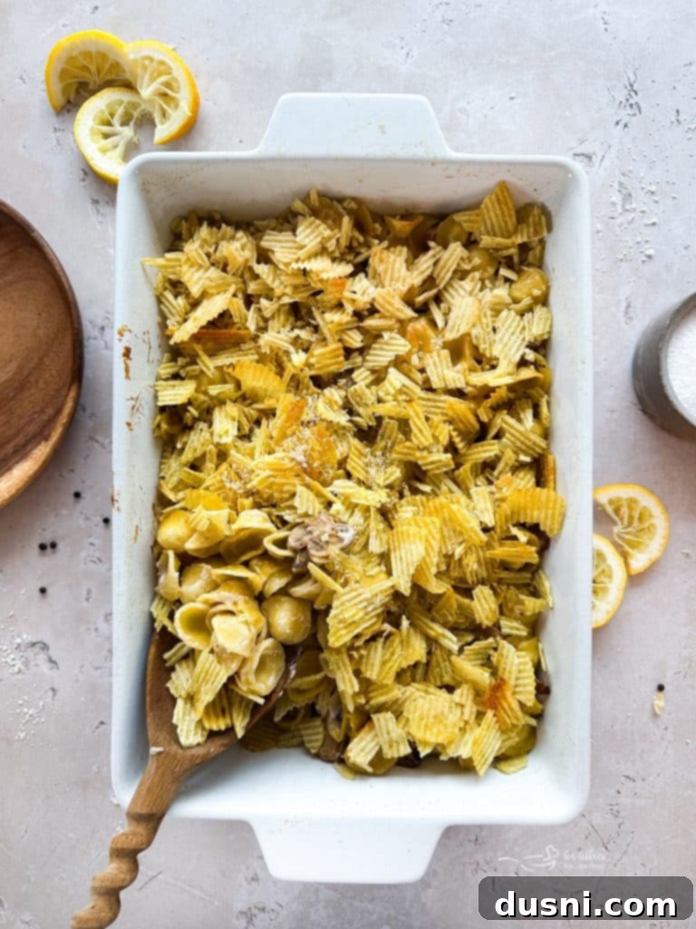 Close-up of bubbling Tuna Tetrazzini Casserole with crispy potato chip topping