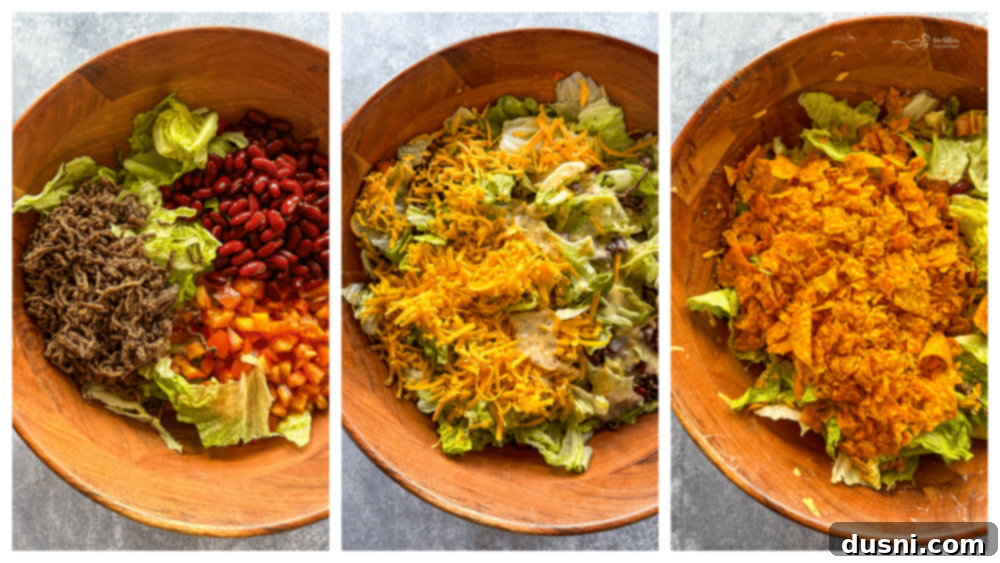 Ultimate Doritos Taco Salad 8 A close up of the mixed Doritos Taco Salad with Italian dressing, showcasing its vibrant colors and textures.