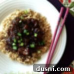 Overhead of Copy Cat P.F. Changs Mongolian Beef on a white plate