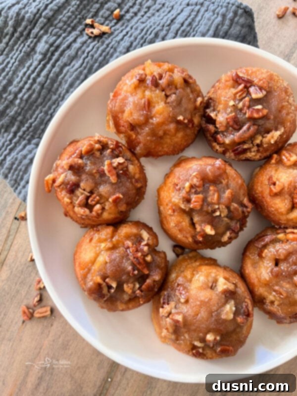 Creamy Peanut Butter Banana Delight 8 fluffy banana bread cinnamon rolls on white plate