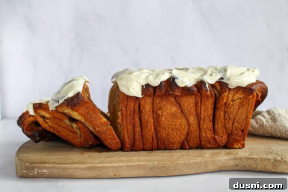 Warm Cinnamon Pull-Apart Perfection 2 Soft and chewy cinnamon pull apart bread topped with cream cheese frosting