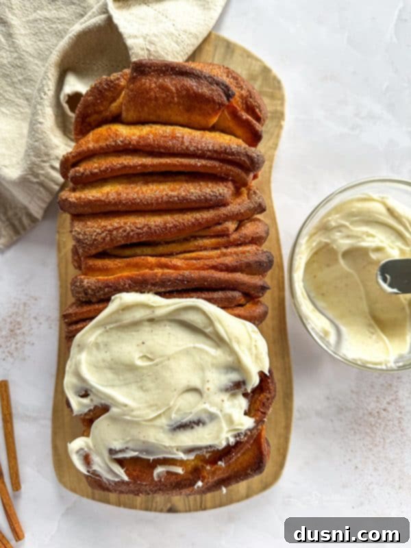 Warm Cinnamon Pull-Apart Perfection 16 Golden brown cinnamon pull apart bread cooling on a rack
