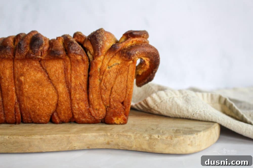Warm Cinnamon Pull-Apart Perfection 4 Warm cinnamon pull apart bread cooling on a wire rack