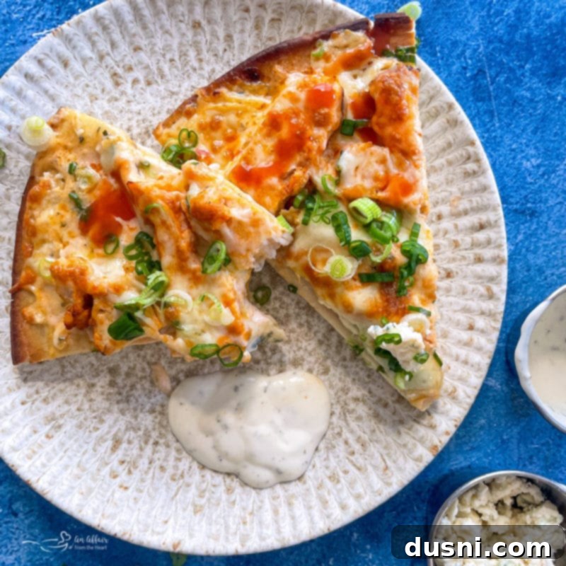 Buffalo chicken pizza with ranch drizzle