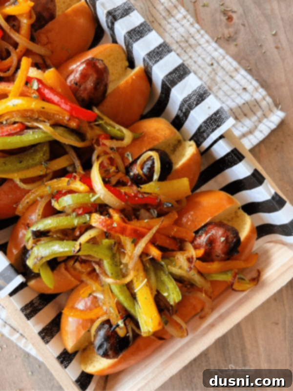 Italian Sausage with Peppers & Onions on a decorative plate
