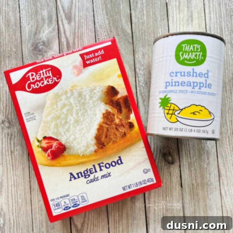 Ingredients for two-ingredient pineapple angel food cake: a box of angel food cake mix and a can of crushed pineapple