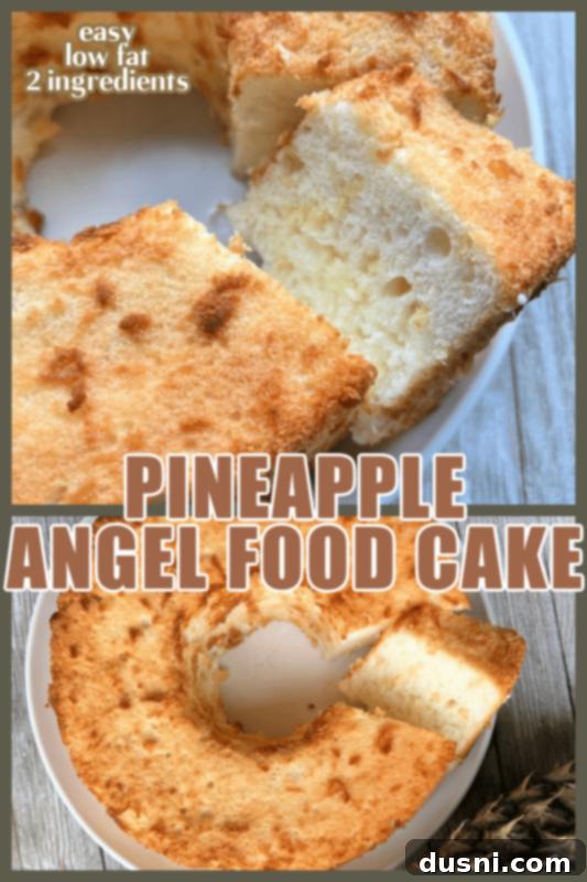 A beautifully baked pineapple angel food cake on a white serving stand, ready for slicing