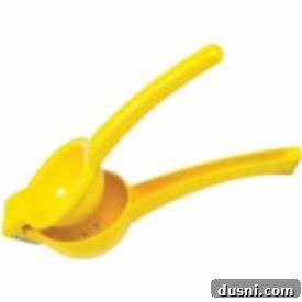Essential kitchen tool: a Winco Lemon Squeezer for fresh citrus juice.